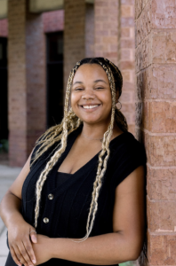 A woman smiling. 